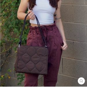 Brown quilted puffer bag. Only used twice. Purchased for 65.